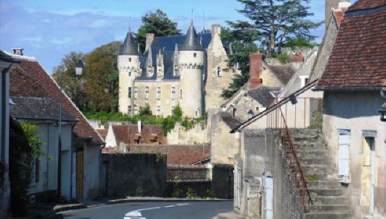 view of Montresor chateau from the main street of the village